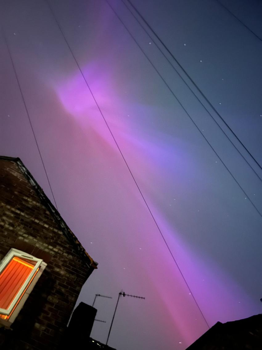 The Northern Lights can be seen above Withington, Manchester in this image.