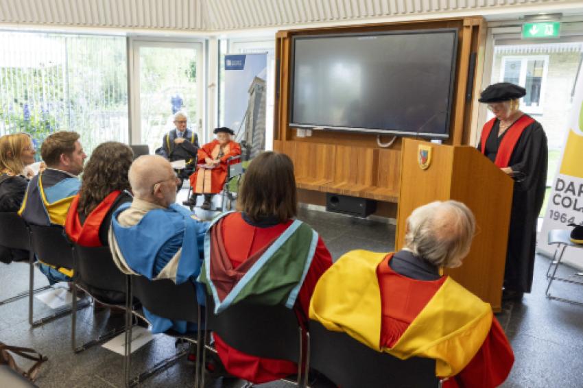 Mary Fowler speaks at her mother's honorary graduation ceremony.