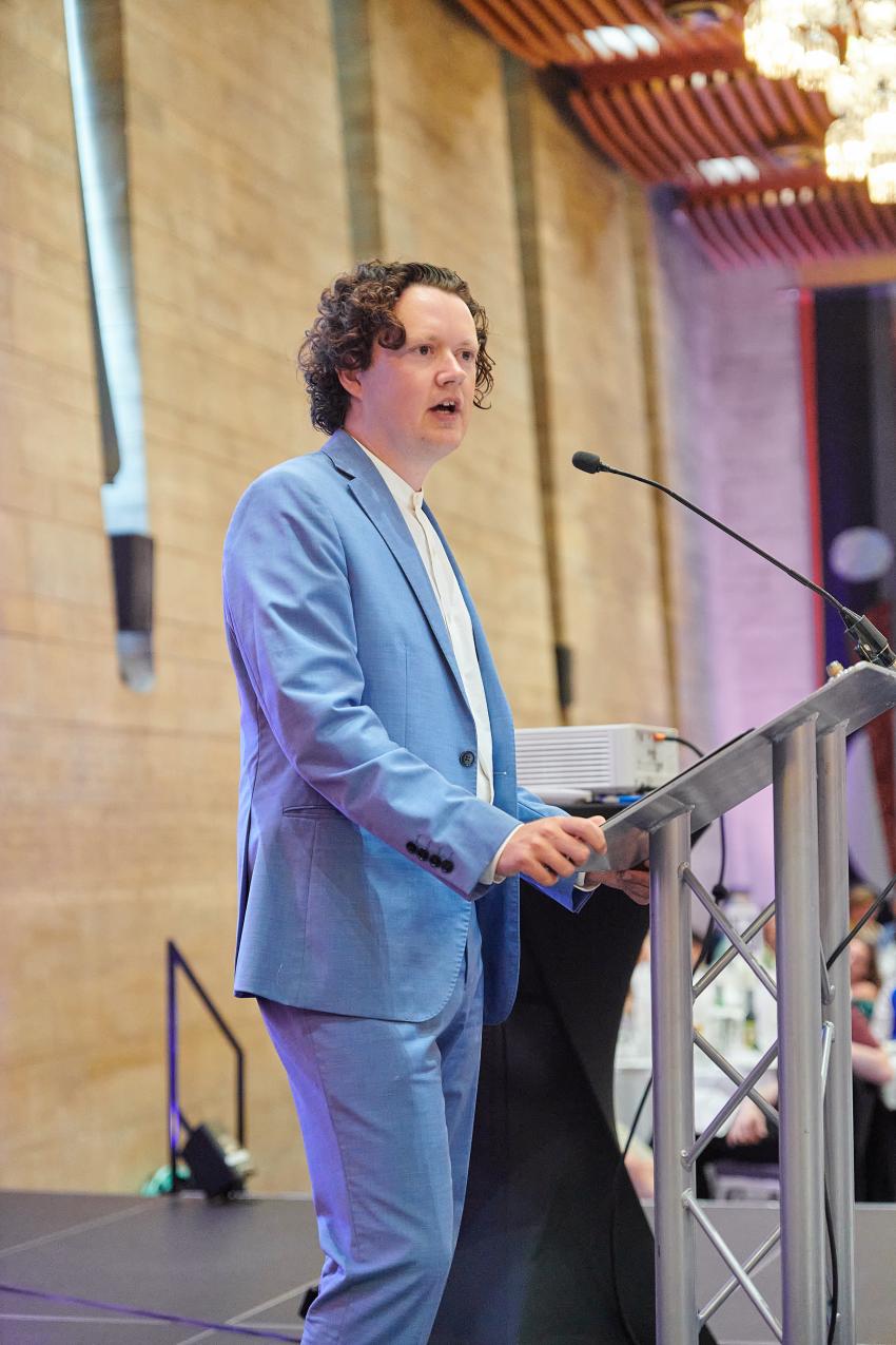 Dr Niall Jeffrey, of University College London, gives a speech after being awarded the Early Career Award (A).