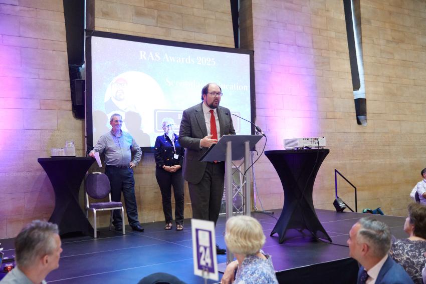 Dr Alex Calverley, of Surbiton High School, gives a speech after receiving the Secondary Education Award.