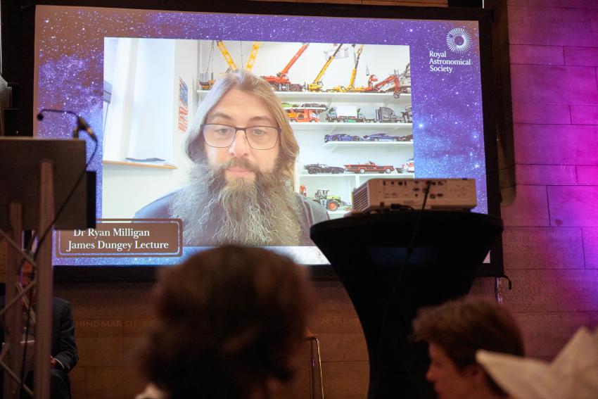 Dr Ryan Milligan, of Queen's University Belfast, delivers a recorded video message after being awarded the James Dungey Lectureship.