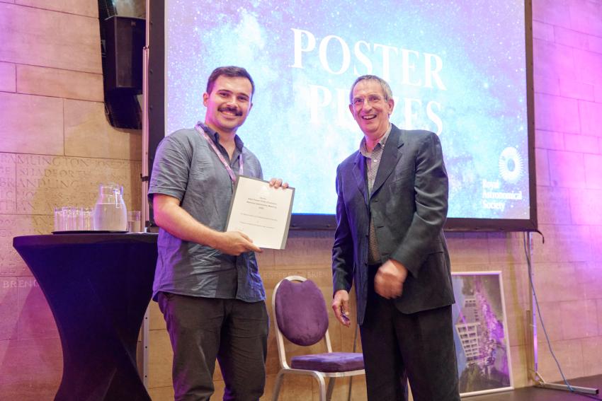 Max von Wietersheim-Kramsta is congratulated for winning the RAS Post Doc Prize for his poster titled 'Forward-modelling the galaxy-halo connection'.