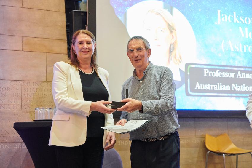 Professor Anna Moore, of Australian National University, is presented with the Jackson-Gwilt Medal (A) by RAS president Professor Mike Lockwood.