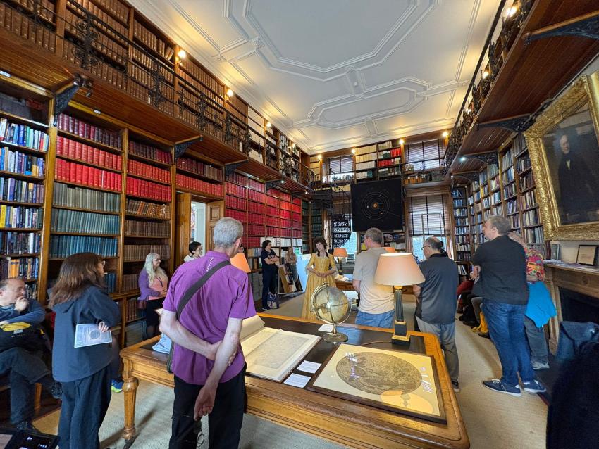 RAS Open House visitors peruse the library exhibits.