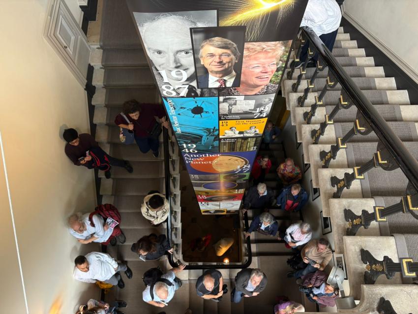 Visitors walk up the stairs at the RAS offices.